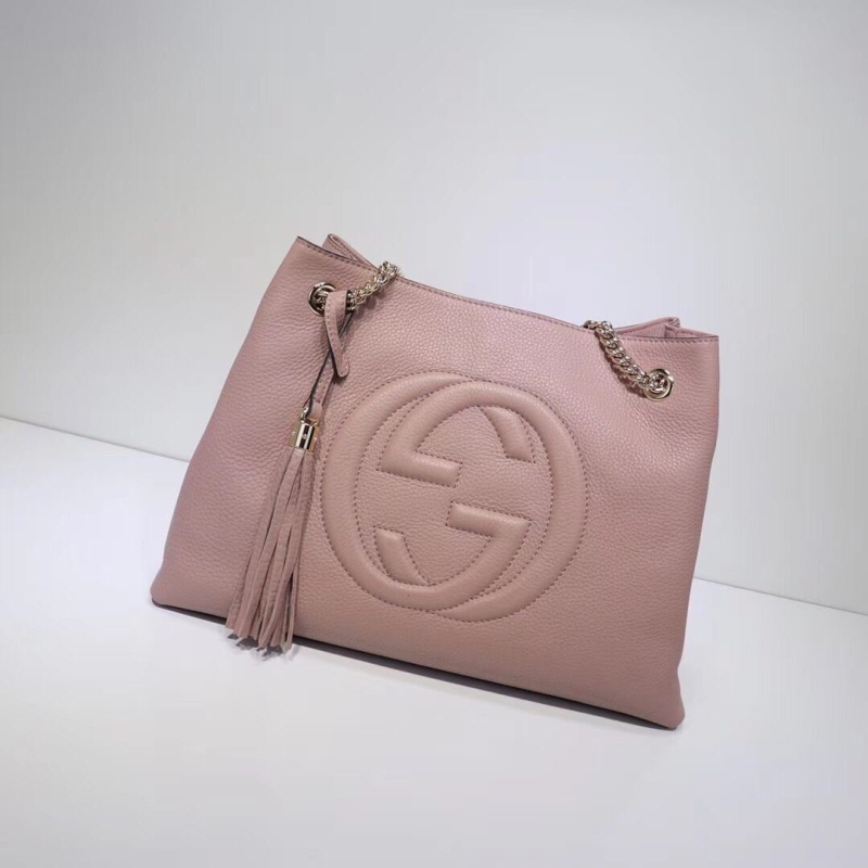 G*u*i shopping bags